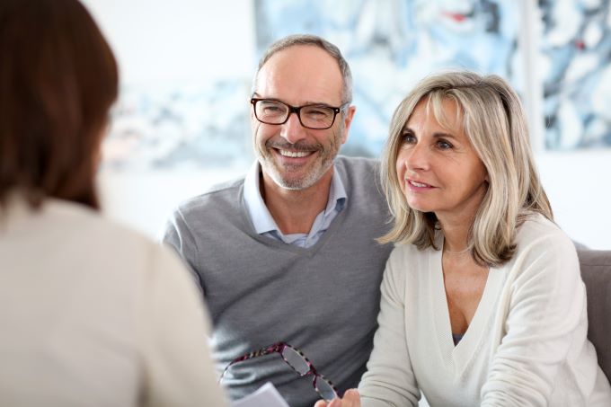 senior couple meets with a professional