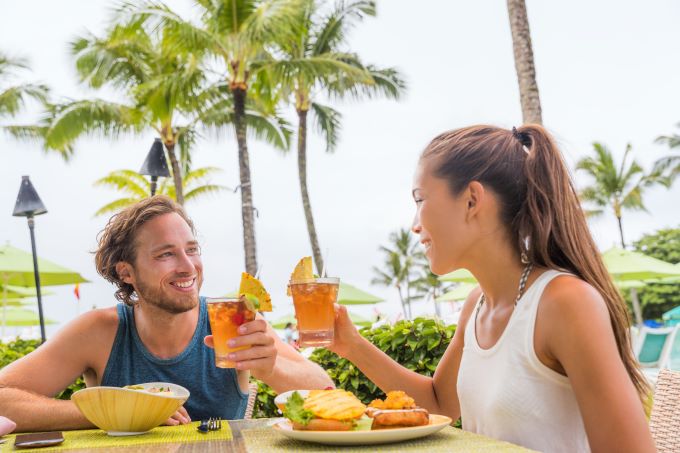 couple eating at tropical restaurant